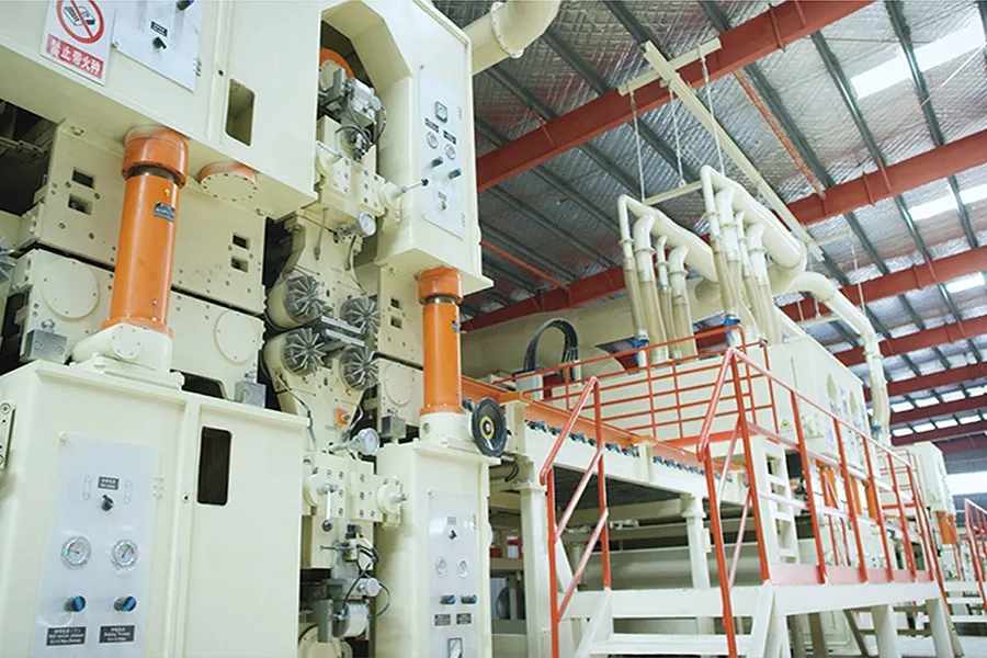 Mat-forming station control housing with hydraulic cylinders and gauges on a Ningfeng production line
